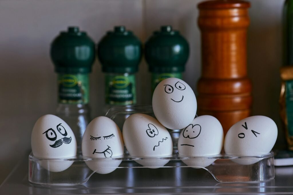 cuida tu mente, white and black eggs on glass rack
